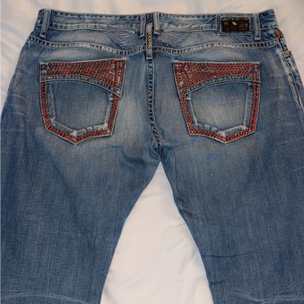 Embellished Denim Jeans with Red Accents